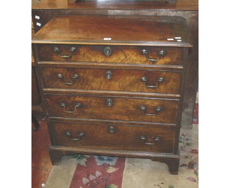A George III mahogany small chest of two long drawers and cupboard below on bracket feet, 80cm x 76cm x 43cm