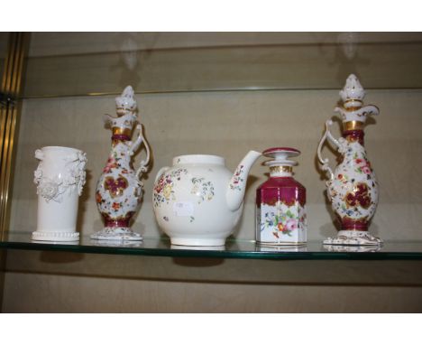 An 18th Century Worcester teapot, flower pattern, missing lid and a pair of 19th Century French decanters with stoppers and o