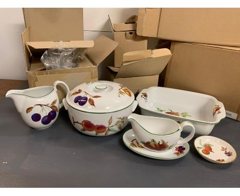 A selection of boxed sets of Royal Worcester "Eversham Vale" dinner service.