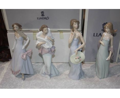 Four boxed Lladro figures