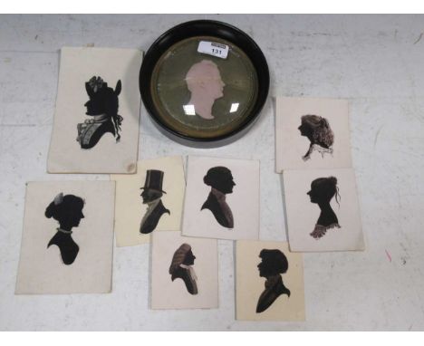 A group of late 20th century side profile silhouettes together with a circular glass framed portrait (qty)