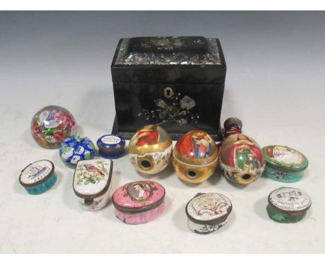 A black japanned mother of pearl inlaid trinket box, 11 x 13.5 x 10cm; together with seven enamelled snuff boxes, three decor