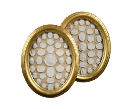 A pair of plaster intaglio displays, in water-gilded oval frames48 x 39cm