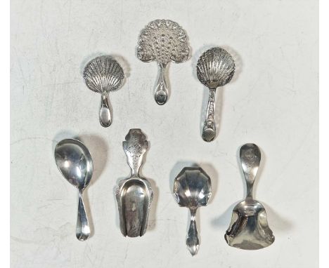 A collection of 7 caddy spoons