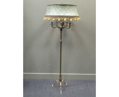 An Edwardian brass floor standing five branch lamp with a white and teal embroidered shade with tasselled fringe, 170cm high 