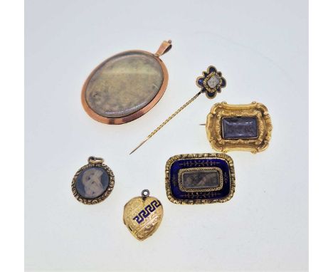 A group of memorial jewels, to include a vacant locket stamped '9C', a stick pin with woven hair, two brooches with woven hai