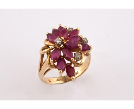 A RUBY AND DIAMOND CLUSTER RING set with circular-cut diamonds and marquise-cut rubies, in yellow gold. Size J 1/2