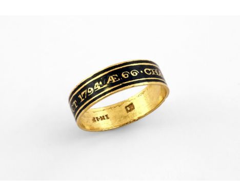 A GEORGE III GOLD AND BLACK ENAMEL MOURNING RING inscribed Charles Robinson Esq OB 24 Oct 1794 AE 66. Size Q 1/2