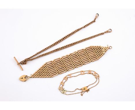 A 9CT GOLD WIDE FANCY GATE LINK BRACELET with padlock clasp, 16.5cm long, 19.6 grams, together with a 9ct gold curb link watc