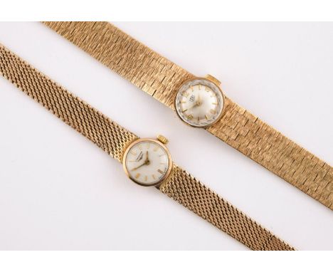 A LADY'S 9CT GOLD WRISTWATCH BY LONGINES the signed circular dial with baton numerals, on an integrated mesh bracelet with la