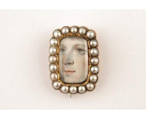 A VICTORIAN PEARL AND GOLD BROOCH the centre section containing a portrait, within a surround of half pearls in gold closed b