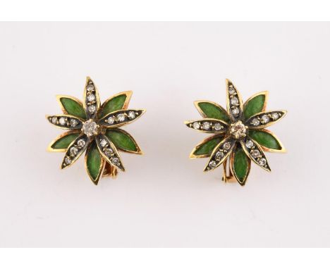 A PAIR OF DIAMOND AND ENAMEL FLOWERHEAD EARRINGS each earring set with circular-cut diamonds, with green enamel leaves, in ye