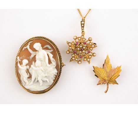 A RUBY AND PEARL FOLIATE PENDANT mounted with circular rubies and half pearls in gold, on a fine link gold chain, together wi