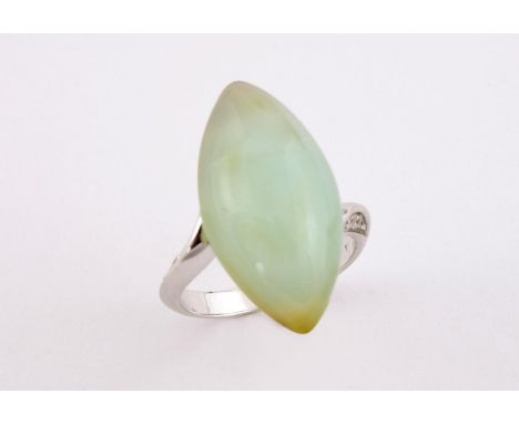 AN OPAL AND DIAMOND RING the marquise-shaped opal is set with four circular-cut diamonds to each shoulder, in 18ct white gold