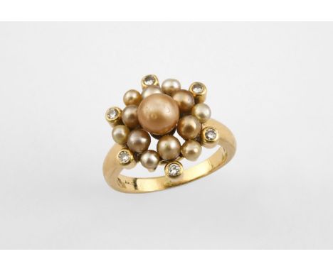 A DIAMOND AND CULTURED PEARL CLUSTER RING BY ASPREY mounted with cultured pearls and collet set circular diamonds in 18ct yel