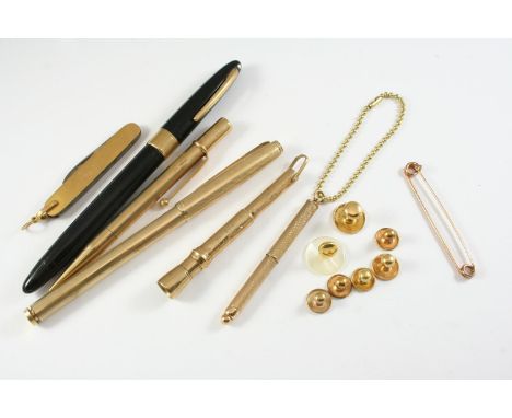 A 9CT GOLD PROPELLING PENCIL BY J. MORDAN &amp; CO 11cm long, together with a 9ct gold swizzle stick, six assorted gold dress