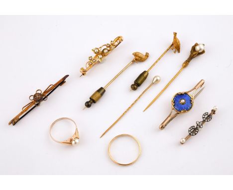 A GOLD GROUSE STICK PIN together with a gold stick pin depicting a partridge, two other stick pins, a rose-cut diamond and pe