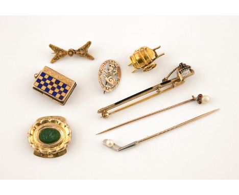 A QUANTITY OF JEWELLERY including a gold and enamel charm, designed as a chess board and containing hair, an enamel and silve