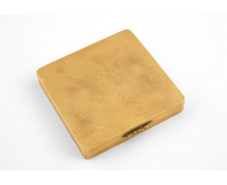 AN 18CT GOLD COMPACT BY GARRARD &amp; CO. LTD of rounded square-shaped with engine turned decoration to both cases, hallmarke