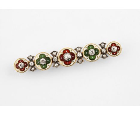 A DIAMOND AND ENAMEL BROOCH formed as five graduated round sections with red, green and white enamel decoration set with circ