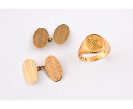 AN 18CT GOLD SIGNET RING engraved with seven arrows, size U 1/2, 8.9 grams, and a pair of 9ct gold oval-shaped cufflinks, wit