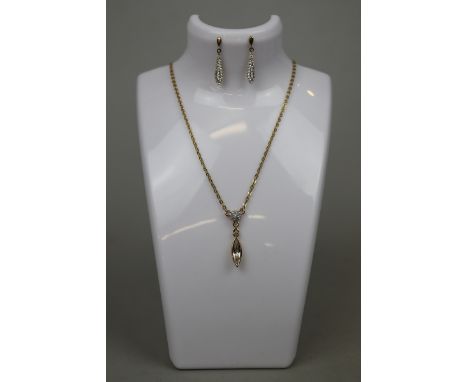 Swarovski pendant on chain together with matching earrings 