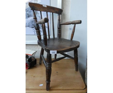 Elm seated child's stick-back armchair 