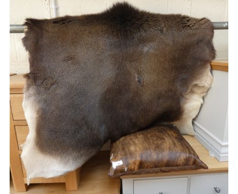 Cariboo hide together with cushion 
