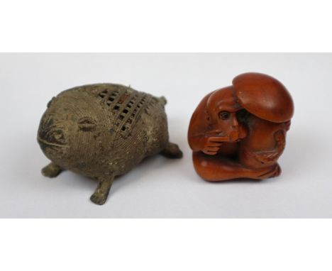 Netsuke together with frog figure 