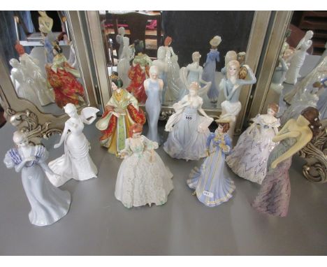 Collection of ceramic lady figurines 
