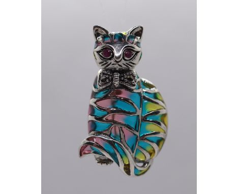 Silver enameled ruby eyed cat brooch 