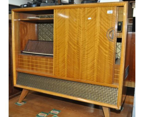 A Vintage walnut cased Grundig radiogramme, with a Collaro turntable, complete with instructions, width 110cm, height 96cm, d