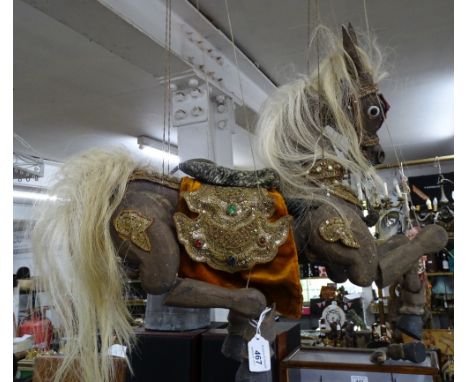 A large Eastern horse figure puppet.
