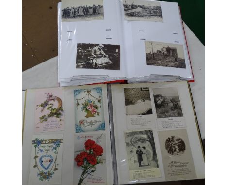 2 Albums of early 20th century postcards including First World War, birthday cards, etc.