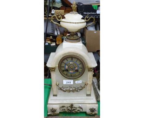 An alabaster mantel clock with applied decoration.