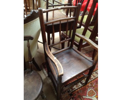 Pair of Antique elm seated kitchen stick back chairs and an elbow chair