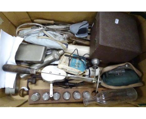 Various medical tools and instruments and bottles.