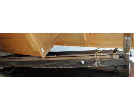 2 Vintage cross cut saws.