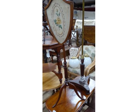 A Regency rosewood standard lamp with brass column, a mahogany pole screen and an inlaid mahogany stretcher table.