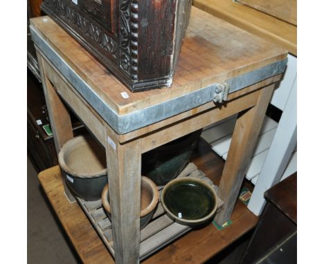 A modern polished pine and beech butcher's block on stand with shelf below, width 60cm, height 90cm, depth 60cm.