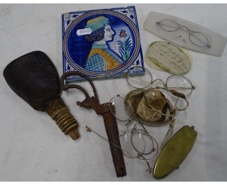 Continental portrait tile, spectacles, powder flask, etc.