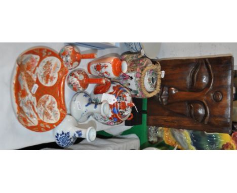 Carved Oriental panel, teapots, etc.