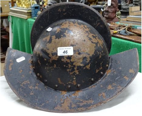 A steel re-enactment soldier's helmet.
