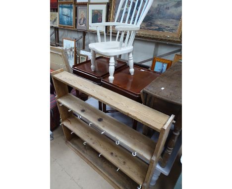A child's painted Windsor stick back elbow chair and a pine plate rack.