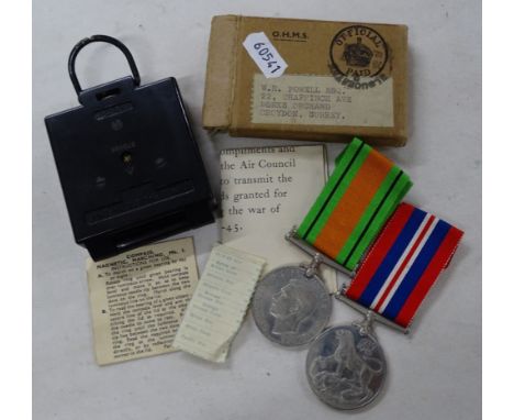 Second World War medals and a military compass.