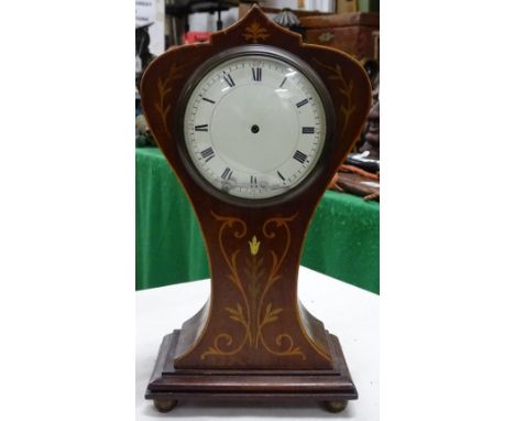 An Edwardian inlaid mahogany mantel clock.