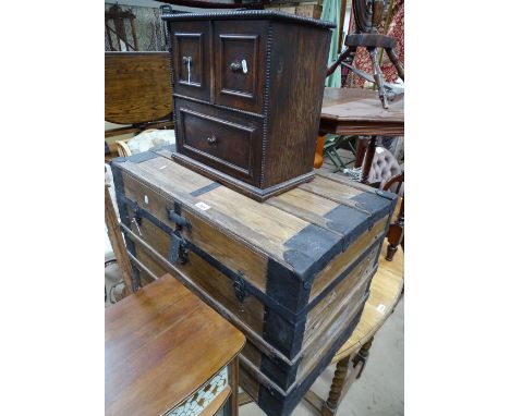 A Vintage pine and bound Seaman's trunk, and a small oak  cabinet.