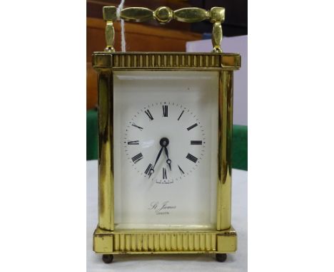 A brass cased carriage clock St. James, London