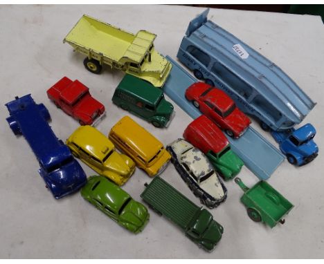 A Dinky Toys car transporter, Kodak van, Corgi car, etc.