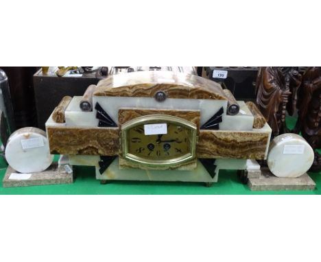 A continental coloured marble 3-piece clock garniture.